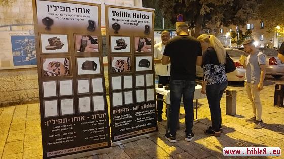 This photo from central Jerusalem captures what is very common today on the streets of Israel: men in kippahs offer passersby to put on tefillin on their heads and hands and recite the Shema Yisrael prayer, thus fulfilling one of the 613 commandments of the Torah